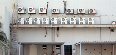 Air-conditioning units on the rear wall of a building