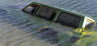 A four wheel drive in the sea