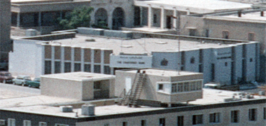 An aerial view of the Chartered bank on Abdullah bin Jassim street, 1974