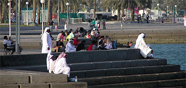 Spectators watching an event in the bay at Doha