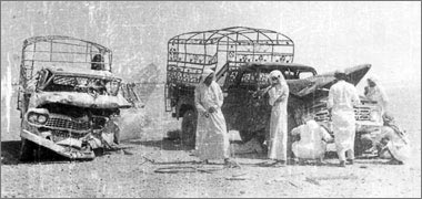 An old photograph of two pickups that crashed into each other