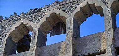 Arches on part of a traditional building undergoing reconstruction