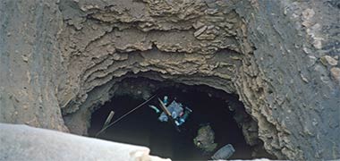 View down into an old well