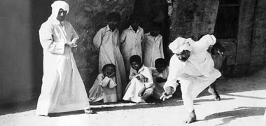 Children playing marbles