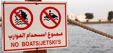 A sign with diacritics missing