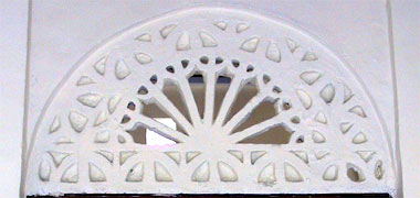 A ventilating naqsh panel over an internal door