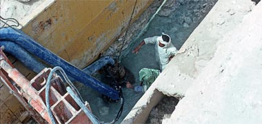 Water in the bottom of excavations in the New District of Doha, March 1983