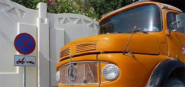 A wall with handholds, a lorry parked illegally, both security risks