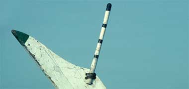 A decorative pole on the prow of a country craft