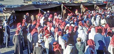 A group of dancers and singers preparing themselves