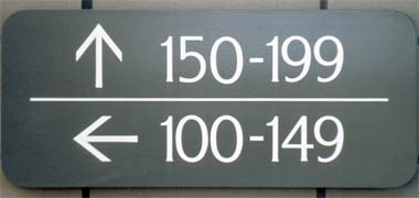 A room direction sign in the United States