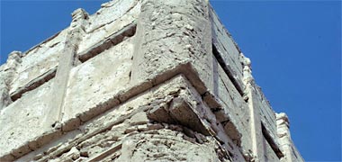 The rounded corner of a structural masonry wall