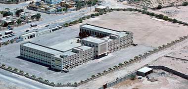 An aerial view of a government school under construction, 1972