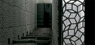 Mushrabiyah hanging from the face of a building