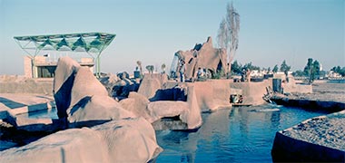 A partial view of the rocks and water features under construction