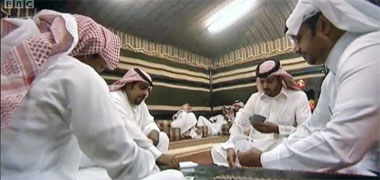 Guests playing cards after the meal