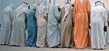 A variety of coloured thubs worn by dancers at a tambura