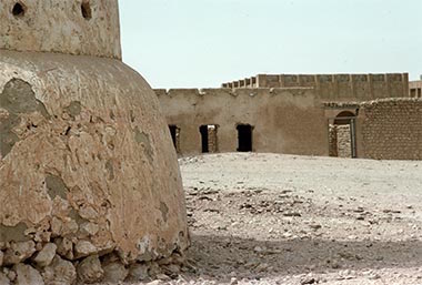 The protective reinforcement of a structure at its base