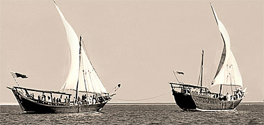 A boom and a shuw’i under sail in the West Bay