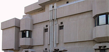 Exposed utilities on face of building